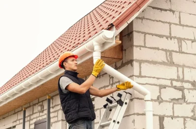 Pose et remplacement de gouttières à la Demie